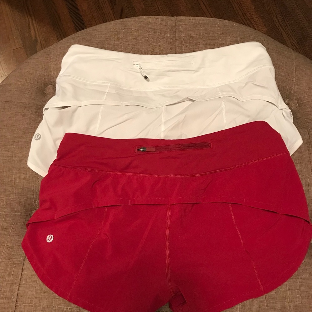 Red and/or white lululemon speed shorts. Sz 6